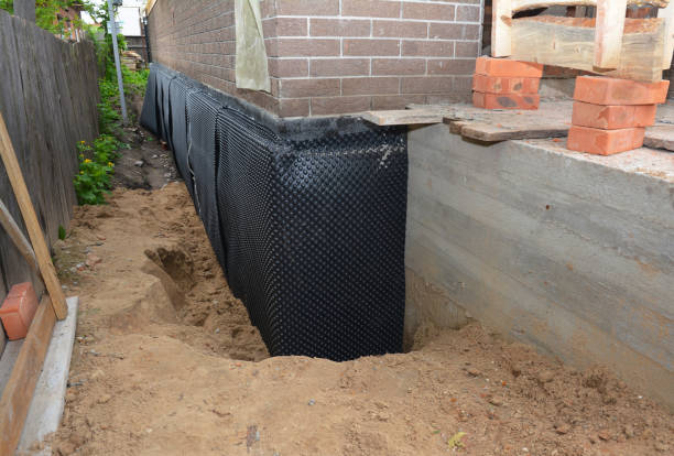 Happy homeowners after waterproofing job in Plainsboro